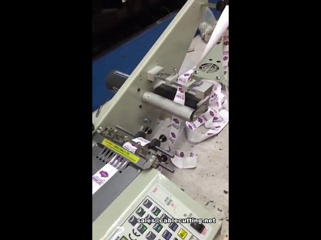 เครื่องตัดป้ายริบบิ้นอัตโนมัติ | เครื่องตัดเทปประสิทธิภาพสูงสำหรับงานอุตสาหกรรม